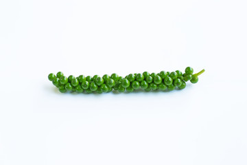 Fresh green peppercorns  on white background.