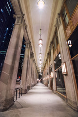 Fototapeta na wymiar Vintage retro city covered sidewalk portico walkway with lights 