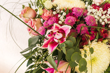 Closeup of beautiful flowers on a light background. Greeting card, mom's day, wedding invitation, birthday. Copy space