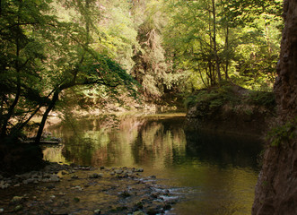 Fototapeta na wymiar Stretch of the Areuses river in the Gorges de l'Areuses near Neuchastel, Romandie