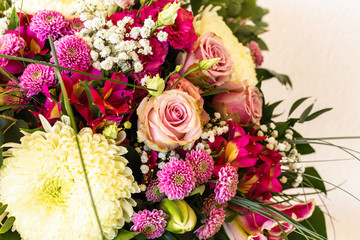 Closeup of beautiful flowers on a light background. Greeting card, mom's day, wedding invitation, birthday. Copy space
