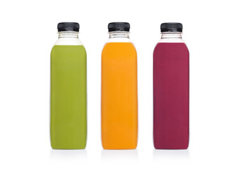 Bottles of healthy fruit juice smoothie