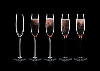 Rose pink champagne glasses with bubbles