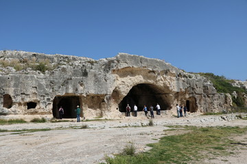 Caves dwellings in Parco Archeologico della Neapoli in Syracuse, Sicily Italy