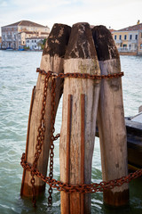 Fototapeta premium massive thick poles pier rusty chain