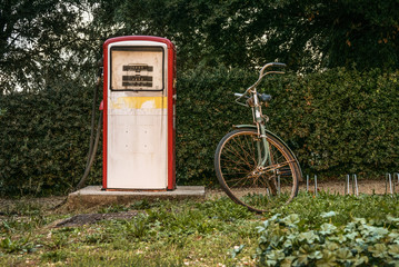 Abandoned fuel pump and bicycle