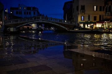 Fototapeta na wymiar venice flood water bridge city night light blue reflection