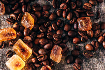 Roasted coffee beans and crystalline sugar