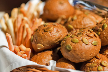 Fresh buns with seeds closeup