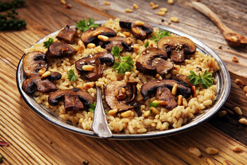 risotto with mushrooms, fresh herbs and parmesan cheese