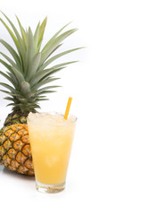 Fresh pineapple juice in the glass isolated on white background