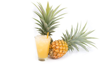 Fresh pineapple juice in the glass isolated on white background