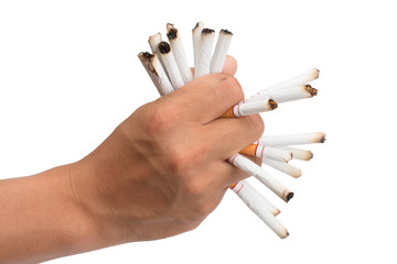 hand of man holds a cigarette in his hand. In order to stop smoke cigarettes is addictive. Health Concepts and Non-Smoking Day. With clipping path
