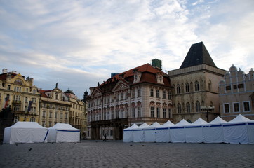 Fototapeta na wymiar Row of white tents on the edge of Old town square in Prague