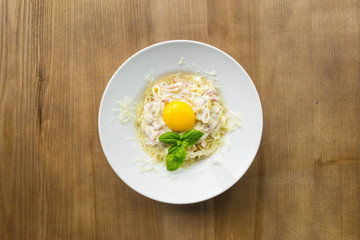 Italian pasta, italian cousine, pasta carbonara, wooden background