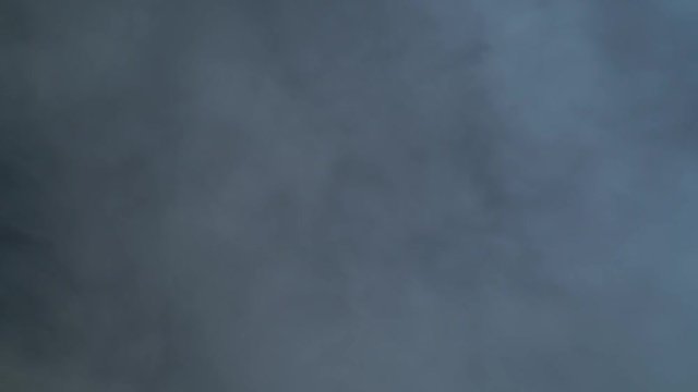 Smoke from top on black background