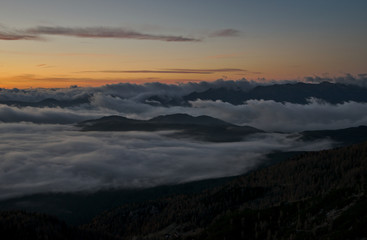 Beautiful sunrise with fog in the mountains