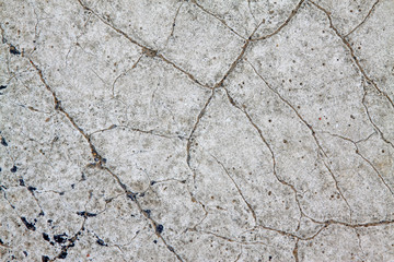 Cracks on the white paint, closeup photo