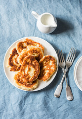 Fried potato scones - delicious breakfast, snack on a light background, top view