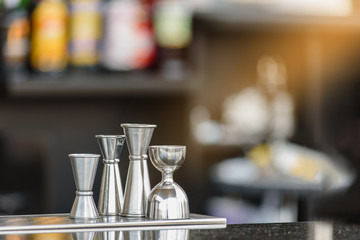 Bar counter with set of mugs in modern spa salon