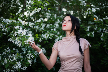 brunette in the colors of the photo shoot outdoors