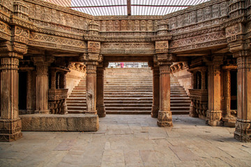 Fototapeta na wymiar Inner view of Adalaj Ni Vav (Stepwell) or Rudabai Stepwell. Built in 1498 by Rana Veer Singh is five stories deep. Ahmedabad, Gujarat, India