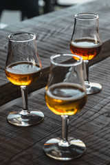 glass of beer on wooden table