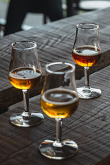 glass of beer on wooden table