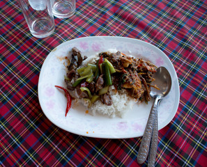 Rice with curry on dinning table