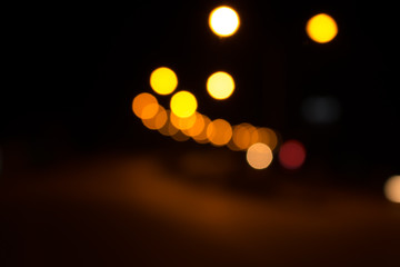 Defocused city night filtered bokeh abstract background