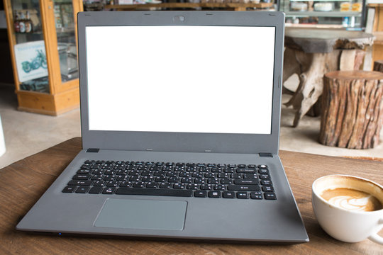Closeup of labtop computer with blank display in coffee shop concept imege made advertize product