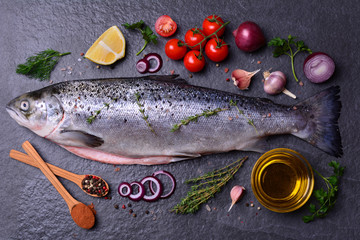 Fish salmon with spices and vegetables