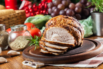 Baked pork ham on cutting board