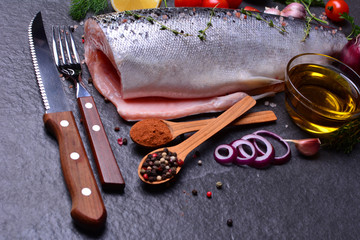 Fototapeta na wymiar Fish salmon with spices and vegetables