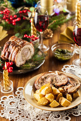 Traditional italian porchetta on festive table