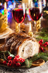 Traditional italian porchetta on festive table