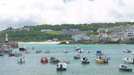 Deckchairs in St Ives harbour (Crane shot).