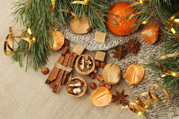 Still life formed with pine branches and New Year sweets	