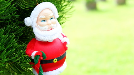 Christmas background with Santa Claus on pine tree