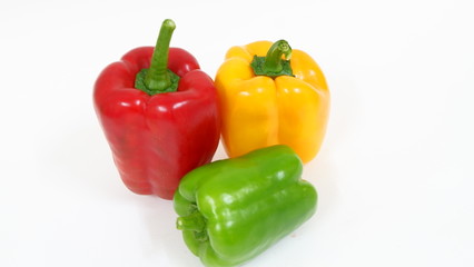 three peppers isolated on white background