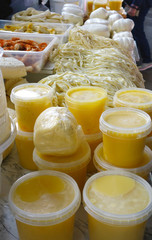 Traditional Caucasian homemade cheese sulguni and Chechil on the market