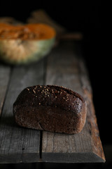 Bread at the table on dark background