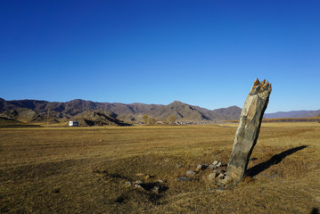 Ancient burial mounds at .Karakol valley (Uch-Enmek park) in Altai Republic,Russia.
