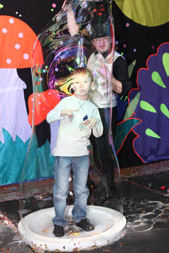 Boy inside the soap bubble