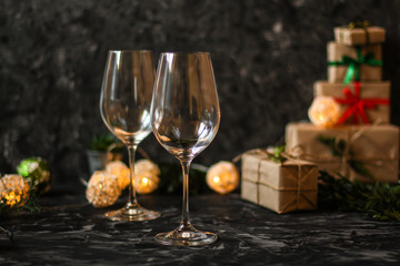 Happy New Year! Traditional New Year's ritual with champagne and gifts. Top view