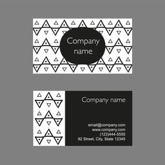 Business card template in black and white. Hand-drawn ethnic patterns of triangles and dots.