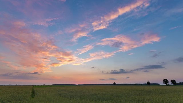4k timelapse of late evening orange sky with cirrus clouds. After sunset sky. 