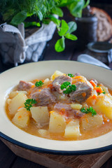 Roast potatoes and turkey meat, selective focus
