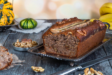 Homemade banana cake on rustic wooden table