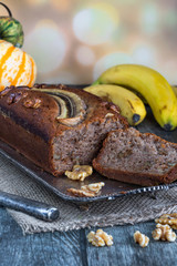 Homemade banana cake on rustic wooden table